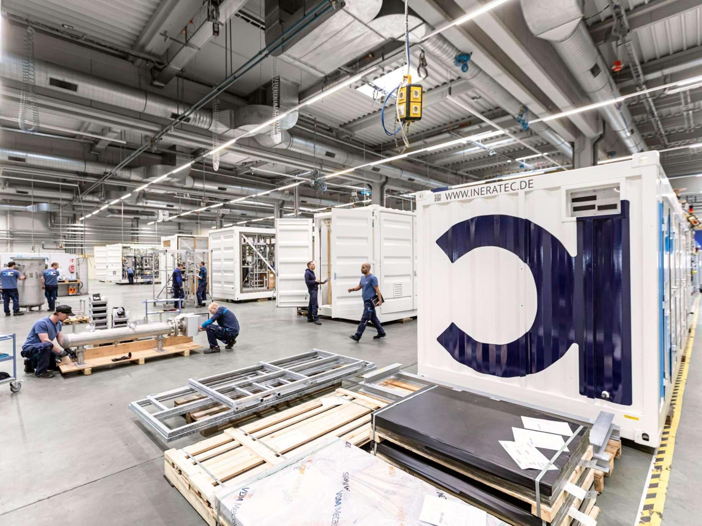 German industrial plant with engineers on the floor